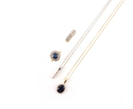 A collection of jewellery, comprising: a sapphire and diamond cluster ring, the cushion-cut sapphire within a surround of old