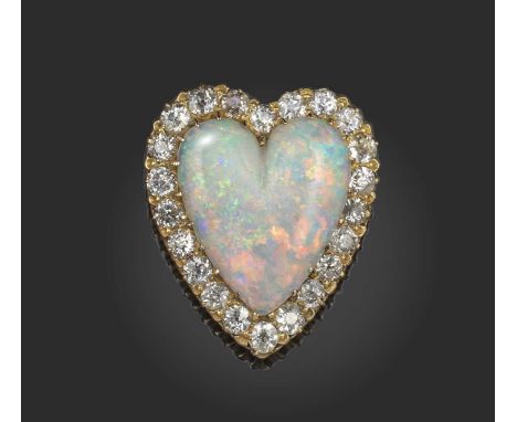A Victorian opal and diamond pendant, circa 1890, of heart-shaped design, the central cabochon opal within a surround of old 