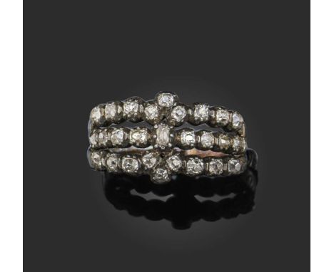 A George III diamond ring, the three rows of old cushion-shaped diamonds in silver and gold closed back collets, size N