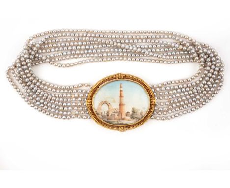 An eight row grey cultured pearl necklace, with a late-nineteenth century gold clasp, with fine pellet and twisted wire work 