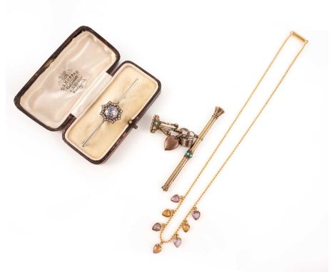 A collection of jewellery, comprising: a pale violet sapphire and diamond bar brooch within star motif in white and yellow go