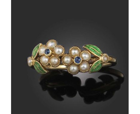 A Regency pearl and enamel flower ring, circa 1830, the flowers set with seed pearls and sapphire centres with green enamel l