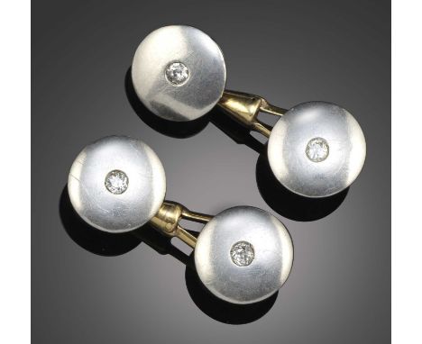 A pair of diamond cufflinks, each set with old circular-cut diamonds in platinum, to yellow gold links, rubbed maker's marks,