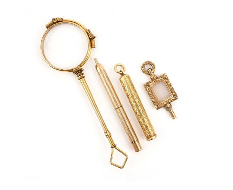 A collection of gold items, comprising: a propelling pencil with engine turned decoration, length 7.2cm; another propelling p