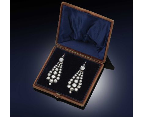 A pair of George III diamond earrings, circa 1800, the articulated drops set with graduated old circular-cut diamonds, suspen