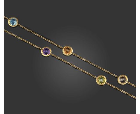 A multi-gem long chain, the faceted topaz, citrine, smoky quartz, amethyst and peridot, in yellow gold mounts to a circular-l