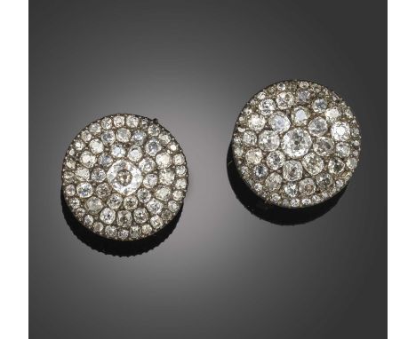 A pair of late 18th century diamond-set buttons later converted to earrings, of circular design, set with concentric borders 