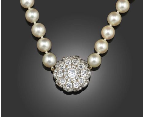 A cultured pearl and diamond necklace, composed of a single strand of cultured pearls measuring 9mm diameter, centred with a 