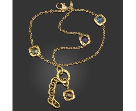 A multi-gem bracelet, the faceted topaz, amethyst and peridot in yellow gold mounts each set to a circular-link chain, all se