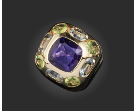 Chanel, an amethyst, peridot and aquamarine 'Coco' ring, of bombé design, the cushion-shaped amethyst within a surround of bu