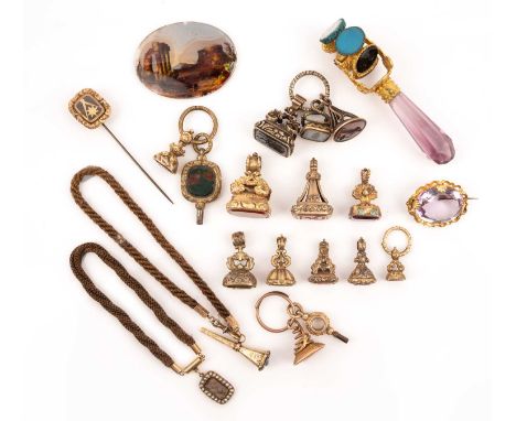 A collection of fob seals and jewellery, comprising: individual gem-set fob seals mounted in gold or gilt metal, one to a gol