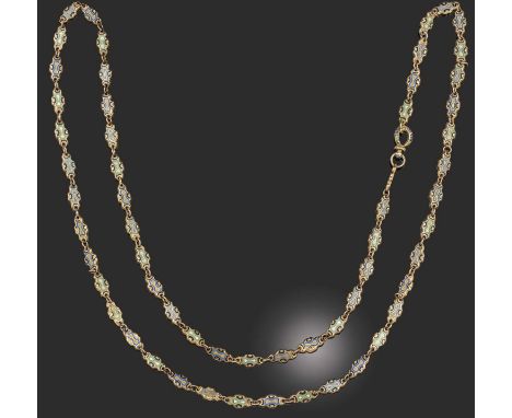 An early 19th century enamel and gold long chain, the cartouche-shaped links decorated with C-scrolls heightened with multi-c