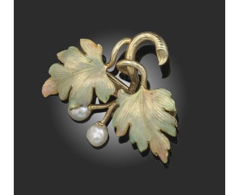 An Art Nouveau enamel and seed pearl brooch, designed as a branch of leaves decorated with irredescent shaded enamel and seed