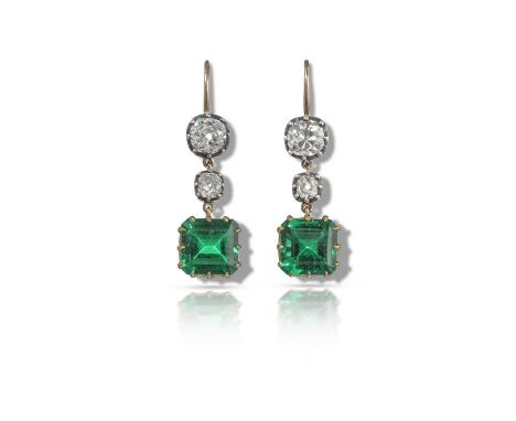 A pair of fine emerald and diamond drop earrings, the graduated cushion-shaped diamonds each suspend square step-cut emeralds