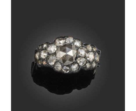 A George III diamond cluster ring, centring on a rose-cut diamond within further surround and shoulders set with rose-cut dia