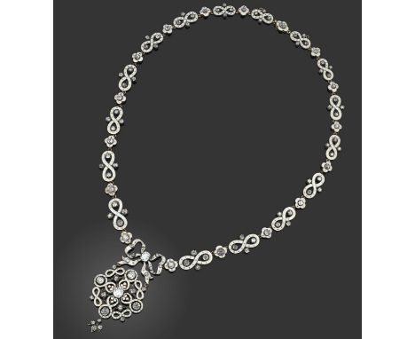 A diamond and enamel necklace, late 19th century, in the manner of Giuliano, the necklace formed of alternating figure-of-eig