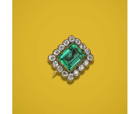 An early 19th century fine emerald and diamond brooch, the step-cut emerald weighing 3.914cts set within a surround of old cu