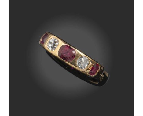 A Victorian diamond and ruby five-stone ring, mid 19th century, rubover-set with three graduated cushion-cut rubies and two o