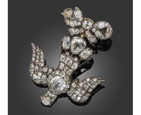 A 19th century Saint Esprit brooch, set with graduated old cushion-shaped diamonds in silver and gold, length 5.2cm, pin and 