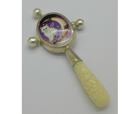 A silver and enamel baby rattle marked 925 sterling silver