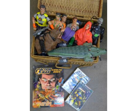 A collection of Action Man figures, eighteen in total, plus bear and alligator, book and two DVDs