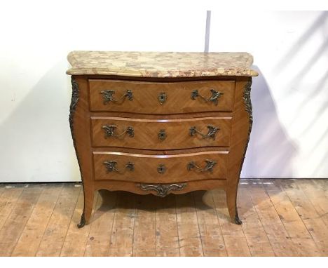 A marble-topped kingwood commode in the Louis XV style, 20th century, of serpentine outline the moulded marble top over three