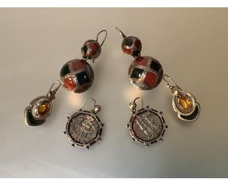A pair of striking Victorian Scottish hardstone earrings, late 19th century, each of two graduated white metal spheres set wi