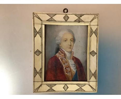 A portrait miniature of a young gentleman in 18th century dress, depicted in red coat and powdered wig, watercolour on ivory,