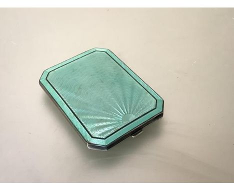 A George VI silver and engine-turned enamel powder compact, Deakin &amp; Francis, Birmingham 1946, of rectangular form, with 