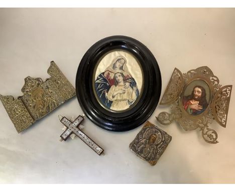 A group of devotional objects, 19th century and later, comprising: an Orthodox brass triptych travelling altar; a wall-mounte