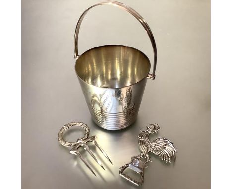 A group of silver plate comprising: a swing-handled pail-form ice bucket with pierced drainer; a late Victorian three-prong b