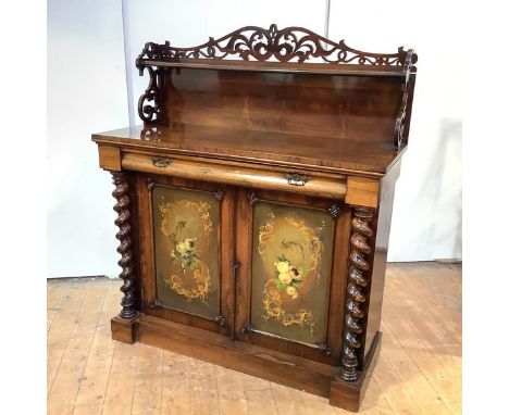 A Victorian rosewood chiffonier, the floral fret-carved raised back with open shelf over a rectangular top above a frieze dra