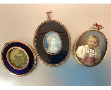 English School, c. 1800, a portrait miniature of a young girl, watercolour on ivory, oval, in a yellow metal and blue glass f