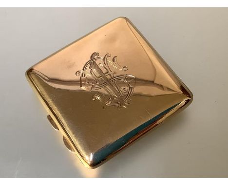 A George V 9ct gold cigarette case, Birmingham 1918, of plain rectangular form, the cover engraved with a monogram. 8cm squar