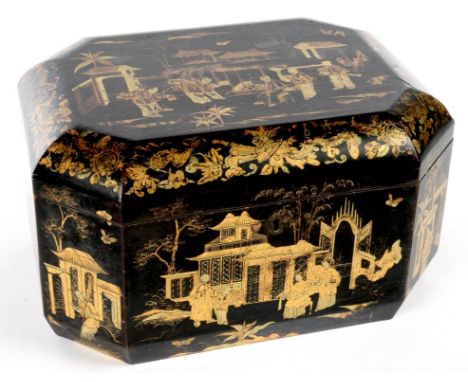 A CHINESE EXPORT BLACK AND GOLD LACQUER TEA CADDY OF TYPICAL CUT CORNERED SHAPE, THE INTERIOR RETAINING THE TWO PEWTER TEA CA