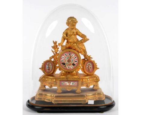 A FRENCH SPELTER GILT DRUM CASED MANTEL CLOCK WITH SEVRES STYLE PINK GROUND PORCELAIN DIAL AND PLAQUES, ON GILTWOOD PLINTH, 3