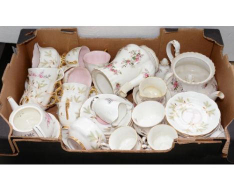 A ROYAL ALBERT BONE CHINA LAVENDER ROSE PATTERN TEA SERVICE AND TWO OTHER ROYAL ALBERT TEA SERVICES, INCLUDING ONE OF PIXIE P