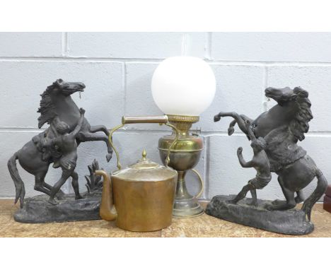 Two spelter Marley horse figures, a Victorian oil lamp converted and a copper kettle