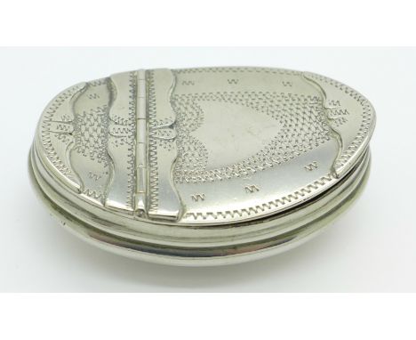 A Georgian navette shaped bright cut white metal engraved snuff box