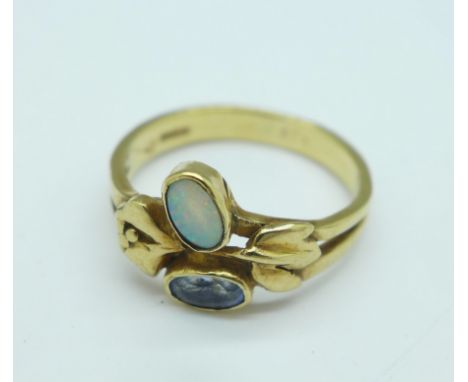 A 9ct gold, opal and amethyst ring, 2.7g, M