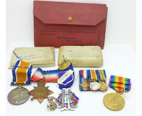 A trio of WWI medals to 730 Pte. R. Revill, Notts &amp; Derby Rgt. with associated papers, the papers in a red War Office fol
