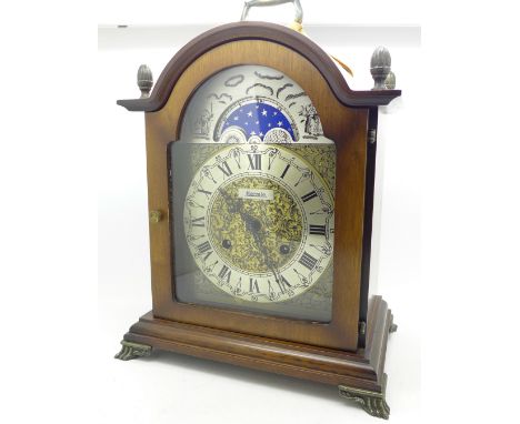 A Hermle bracket clock with moon roller dial