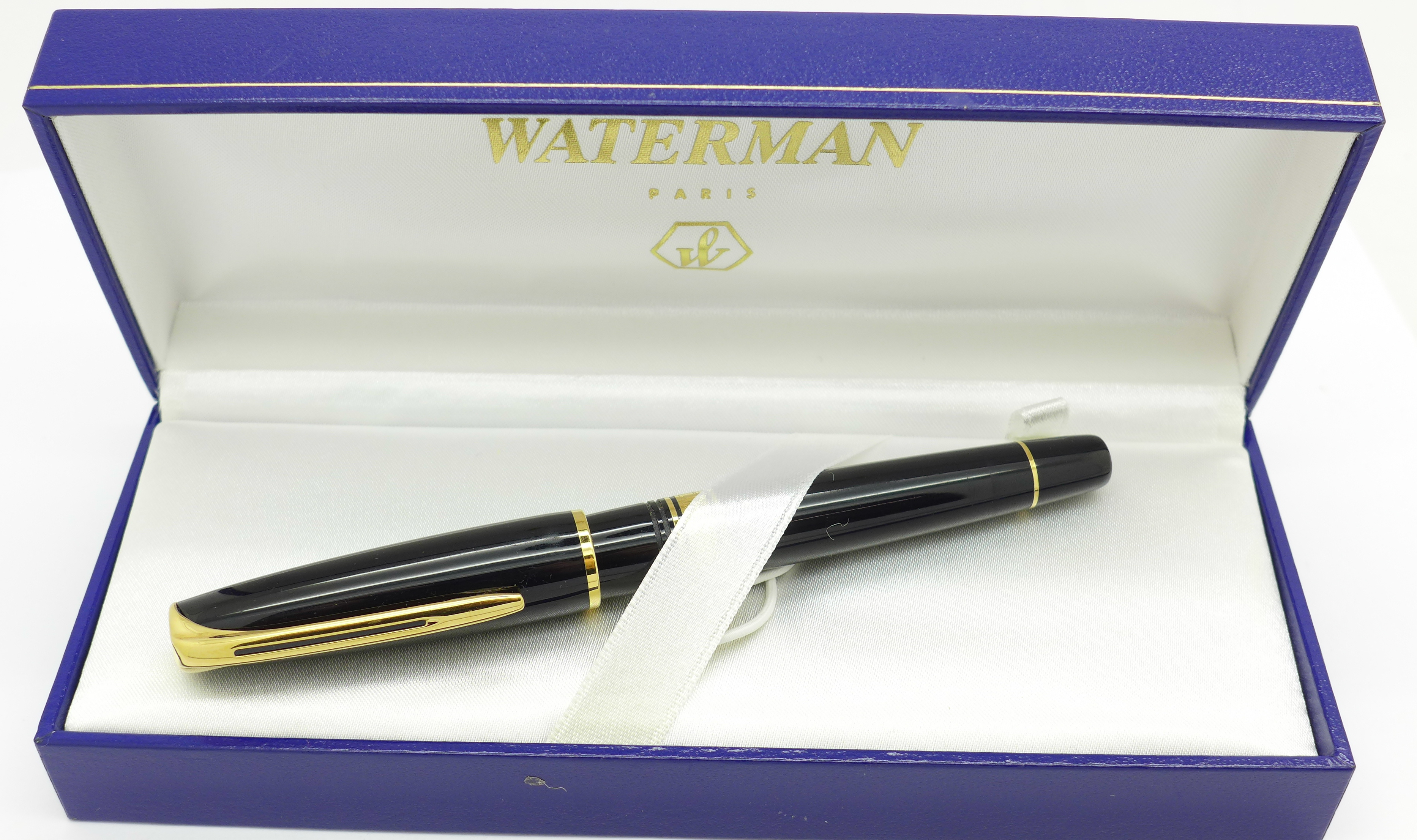 A Waterman cartridge pen with 18k gold nib, boxed