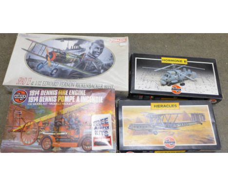 Four boxed plastic model kits, including an Airfix Dennis fire engine