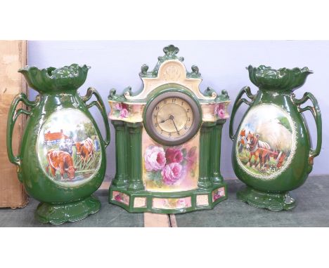 A ceramic clock garniture, one garniture restored