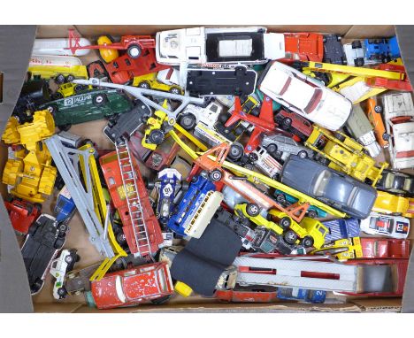 A box of assorted die-cast model vehicles, including Corgi, Matchbox and Dinky