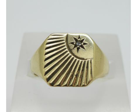 A 9ct gold diamond set signet ring, 3.9g, Q/R