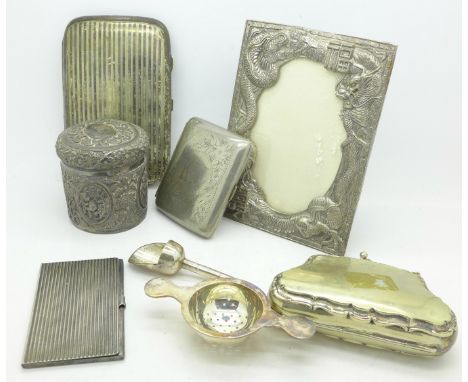 A white metal pot with lid, a plated cigar case, a photograph frame, a cigarette case, a card case, etc.