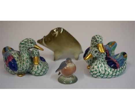 A Hungarian Porcelain Figure Of A Boar By Zsolnay Pecs, 7cm high, also with two porcelain duck groups by Herend of Hungary, 7