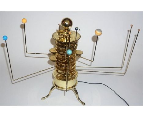 A Replica Gilt Metal Revolving Planet Orrery Clock, in the form of the solar system, fitted for electricity, 39cm high, 